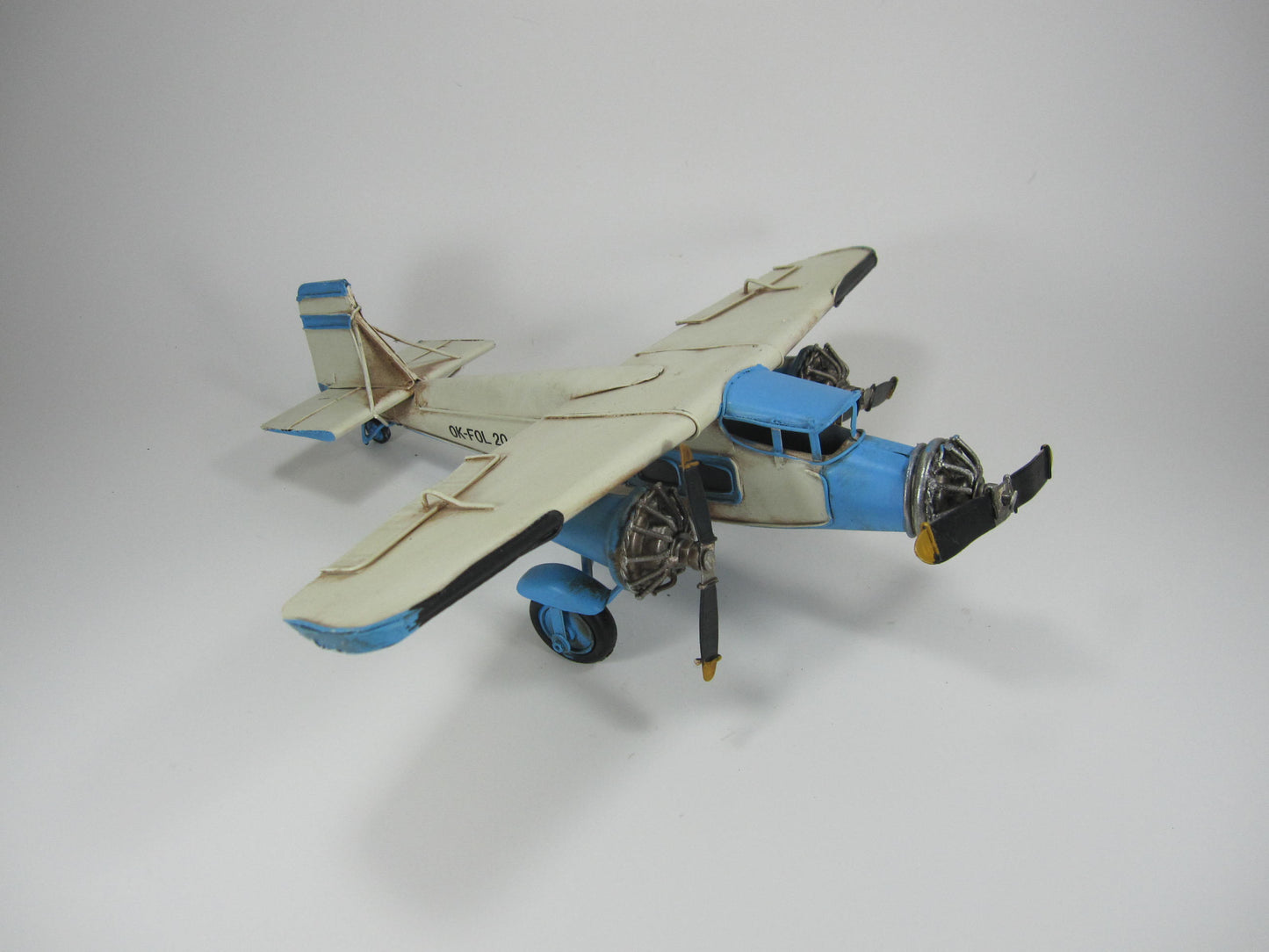 Vintage Propeller Plane – Cream & Blue Handcrafted Metal Aircraft